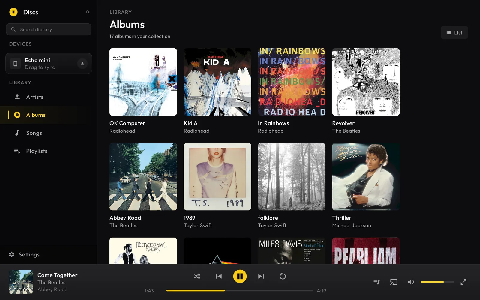 Discs showing a connected Echo mini player under Devices, ready to drag music onto